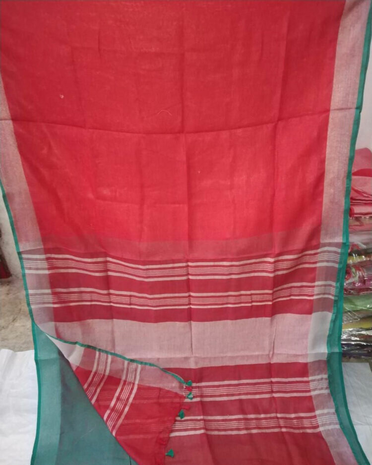 Red plain Linen Saree with Silver Border and Green Contrast Blouse