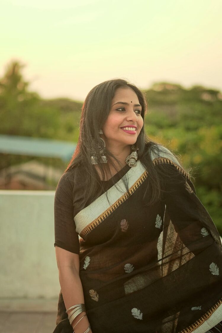 black linen saree with temple border