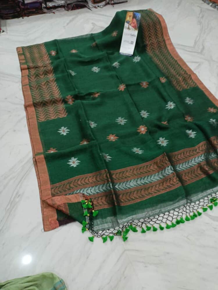 Glorious Green Linen Saree With Thin Copper Border And Lovely Tassels