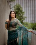 Elegant Peacock Blue Resham Muslin Silk Handwoven Sequins Embeded Saree3