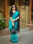 Dark Turquoise Blue Handwoven Linen Silk Saree With Floral Design Pallu