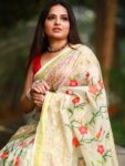 Off-white Resham muslin silk saree with matching embroidered blouse