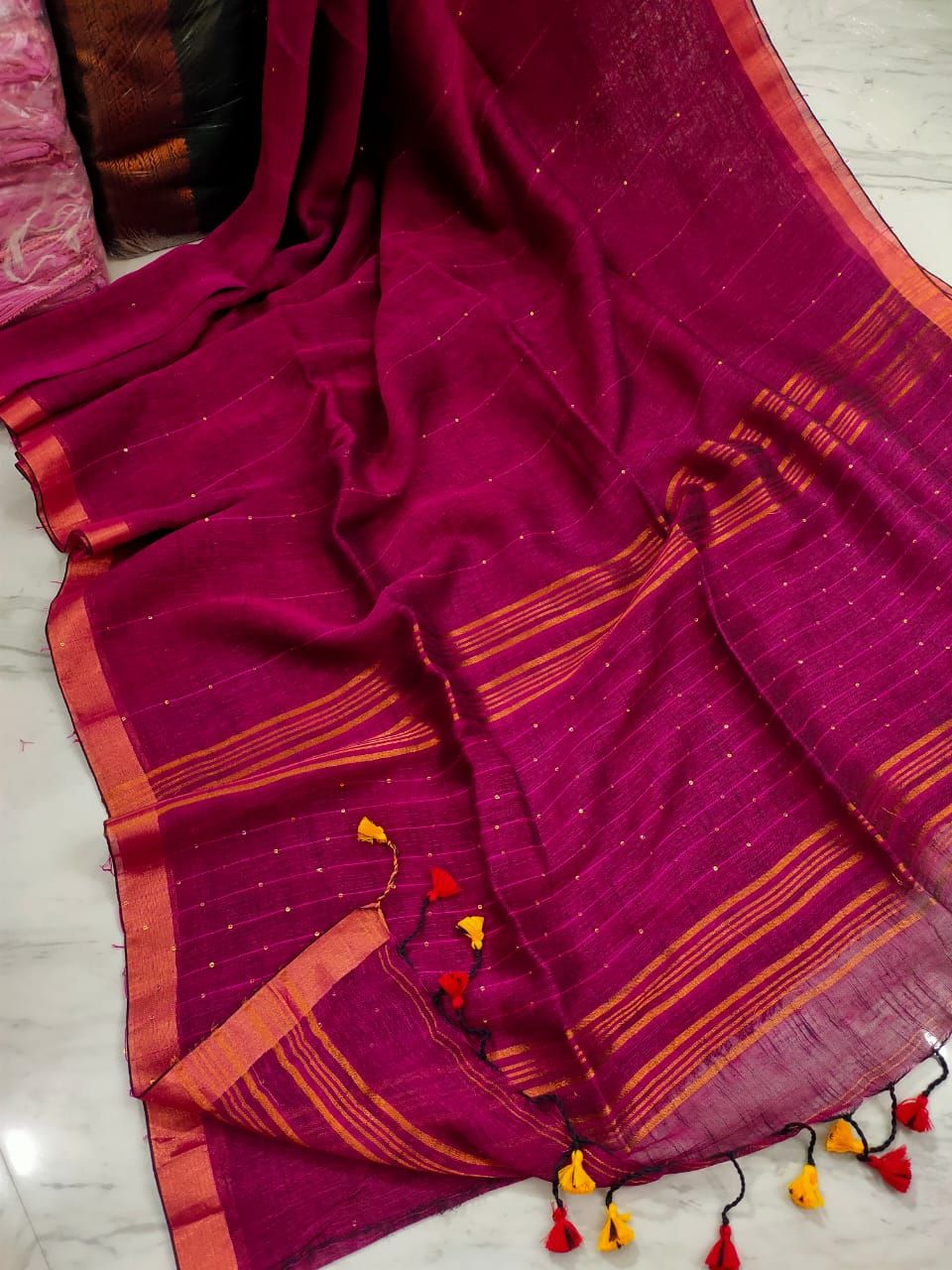 Adorable Dark Pink Handwoven Linen Sequins Saree With Zari Borders