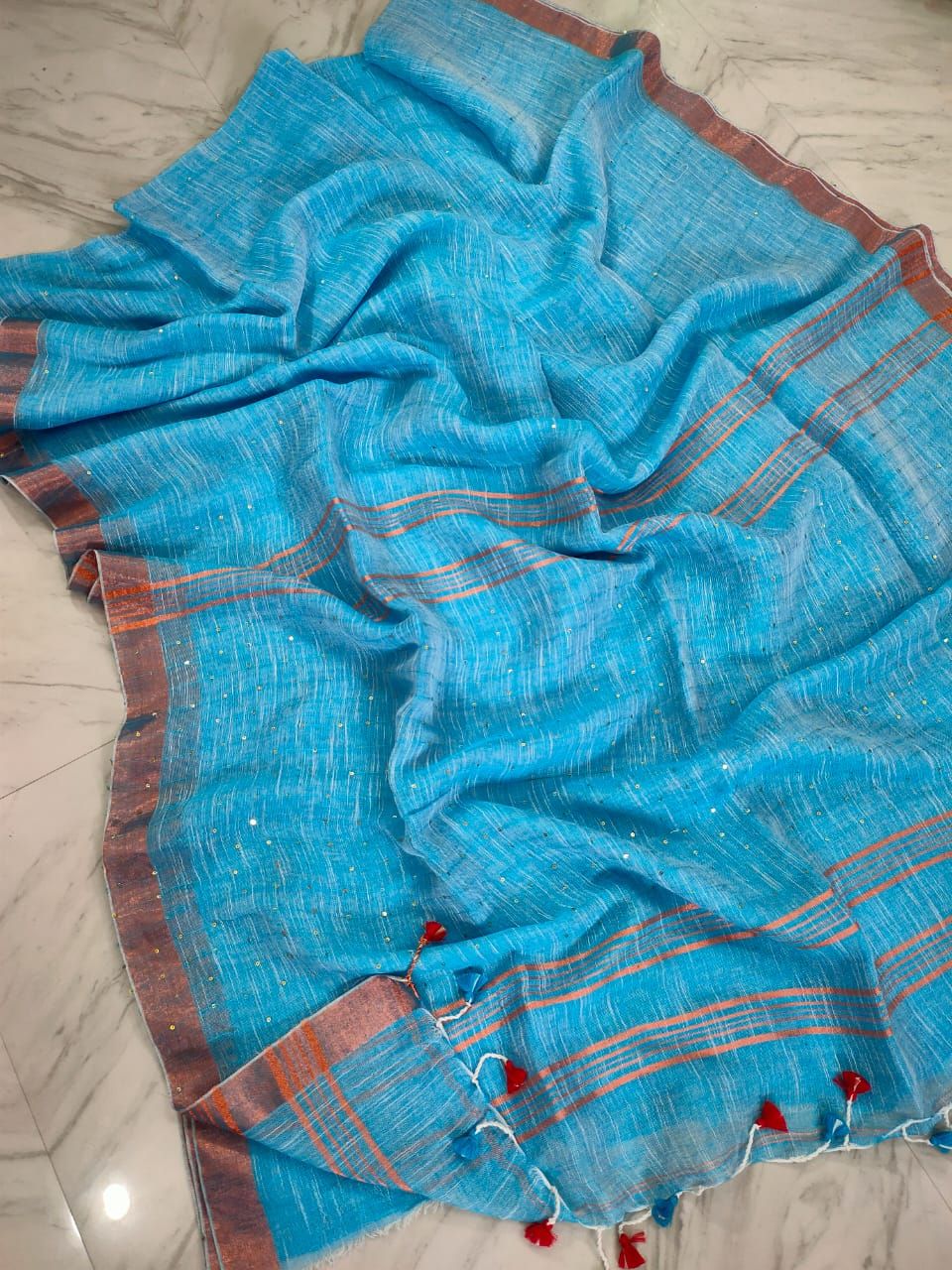 Impressive Sky Blue Handwoven Linen Sequins Saree With Zari Borders