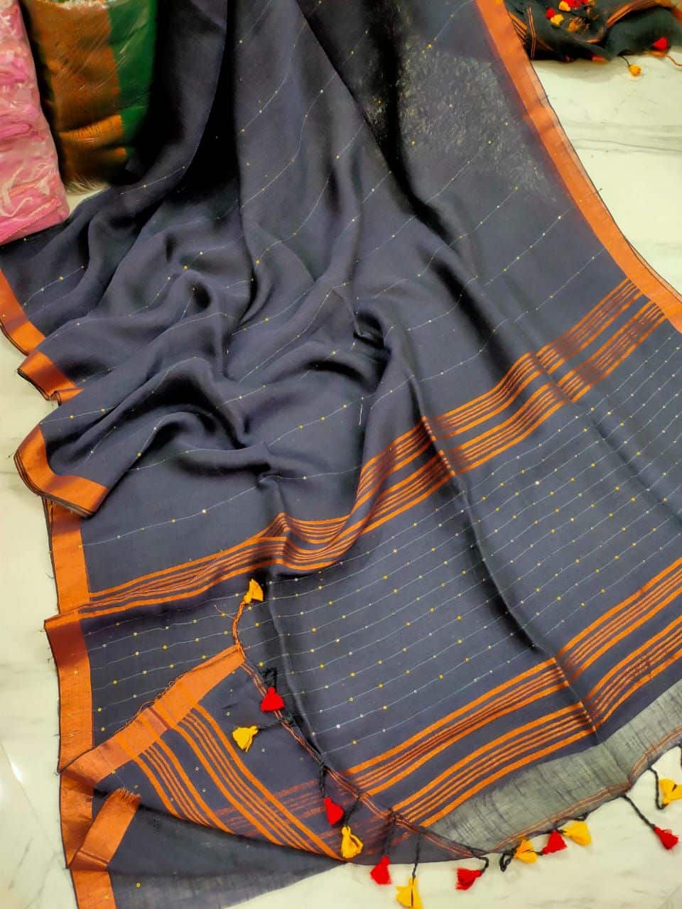 Pleasing Grey Handwoven Linen Sequins Saree With Zari Borders