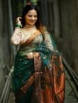 Charismatic Bottle Green Resham Muslin Silk Banarasi Design Saree