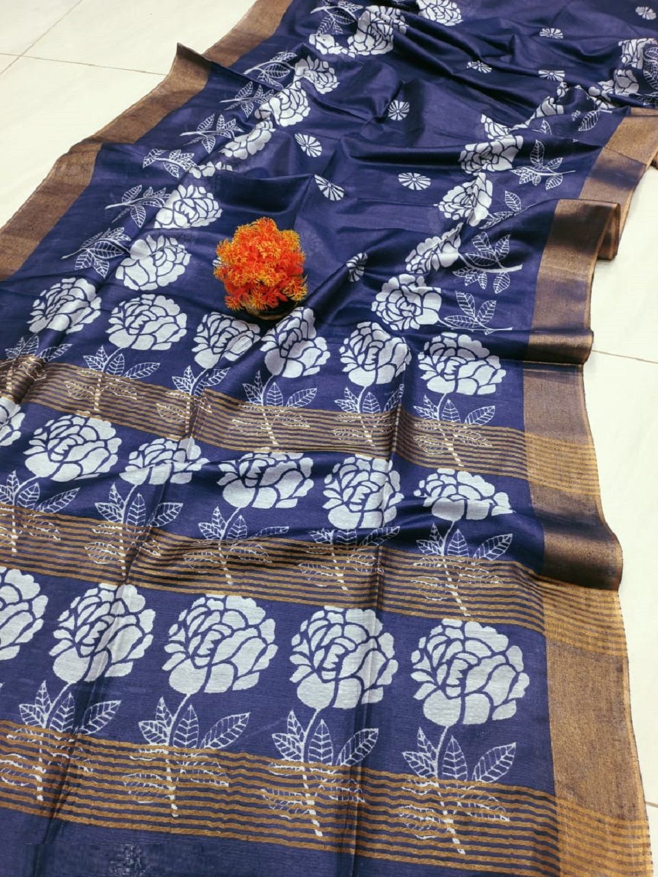 Graceful Indigo Blue Floral Printed Katan Cotton Silk Saree with Golden Border