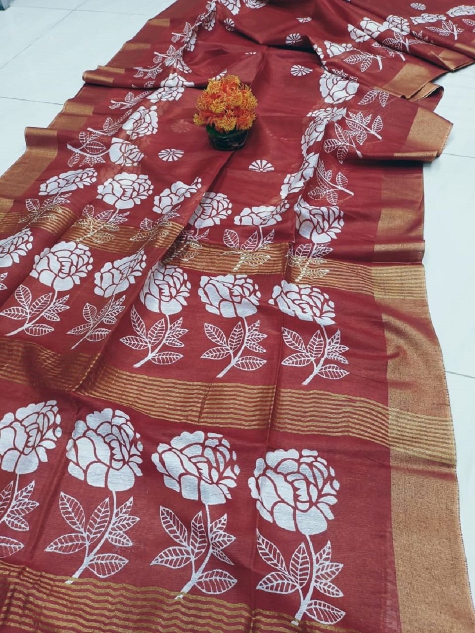 Lovely Brick Red Floral Printed Katan Cotton Silk Saree with Golden Border