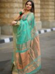 Mesmerizing Turquoise Green Resham Muslin Silk Banarasi Design Saree