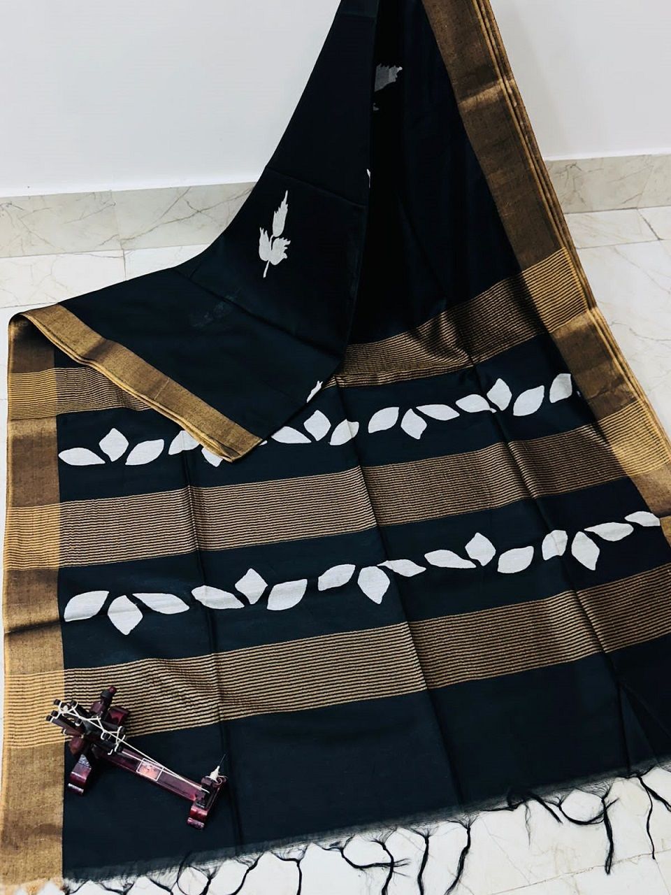 Strong Black Leaf Printed Katan Cotton Silk Saree with Golden Border