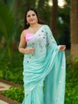 Ocean Green Floral Hand Embroidery Cotton Saree With Silver Border