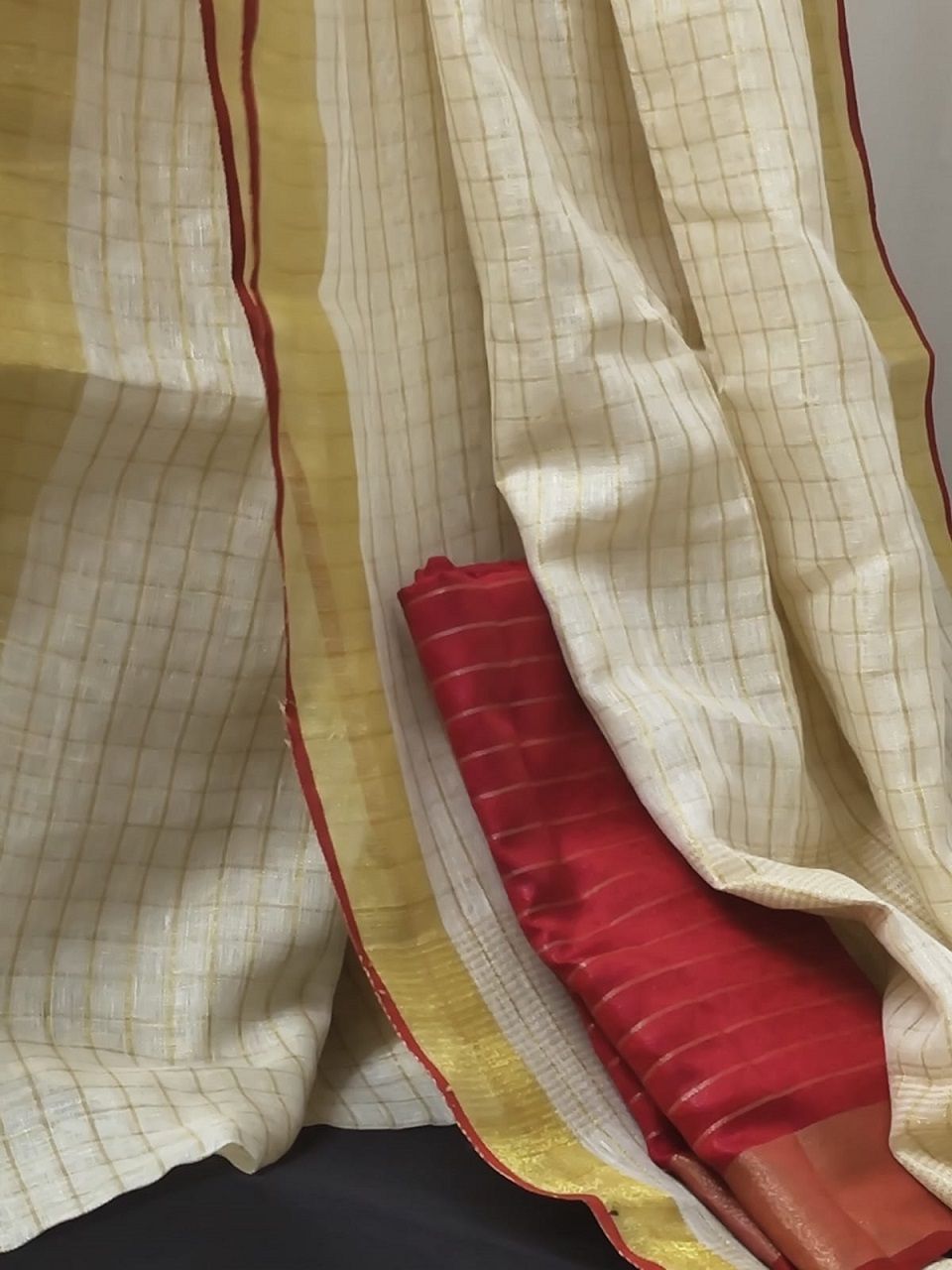 Mesmerising Golden Check Linen Saree With Red Selvedge Border
