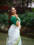 Param Sundari Golden Check Linen Saree With Green Selvedge Border