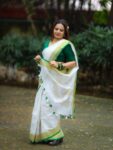 Param Sundari Golden Check Linen Saree With Green Selvedge Border