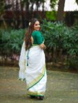 Param Sundari Golden Check Linen Saree With Green Selvedge Border