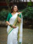 Param Sundari Golden Check Linen Saree With Green Selvedge Border