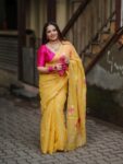 Golden Yellow Tissue Linen Handloom Lotus Motif Saree