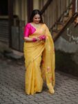 Golden Yellow Tissue Linen Handloom Lotus Motif Saree