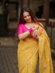 Golden Yellow Tissue Linen Handloom Lotus Motif Saree