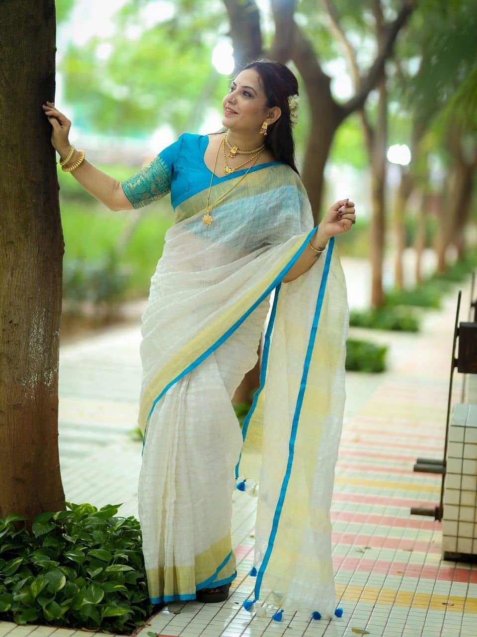 Gorgeous Golden Check Linen Saree With Sky Blue Selvedge Border