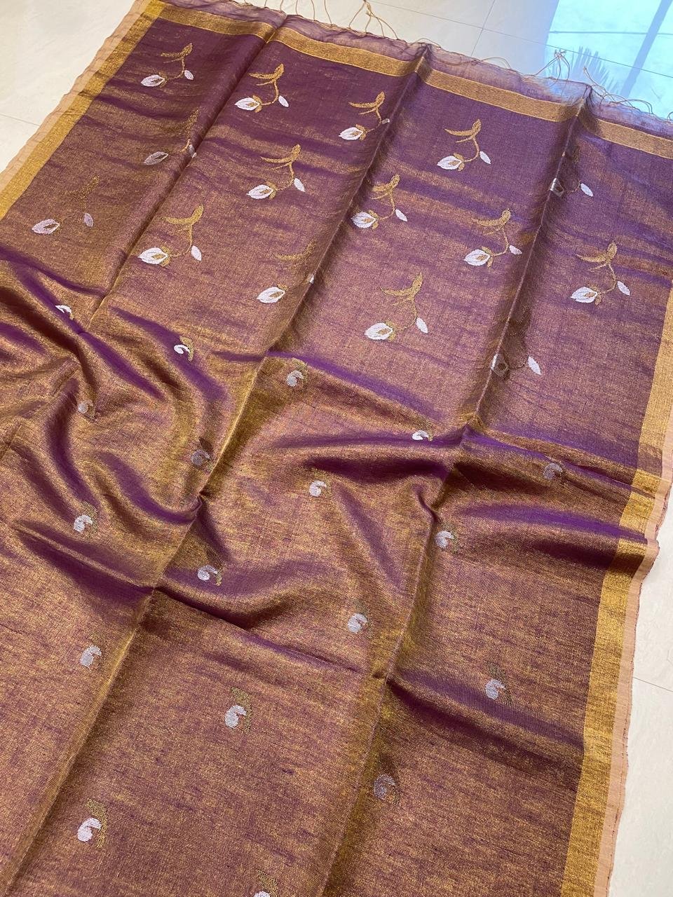 Dazzling Purple Golden Handwoven Tissue Linen Saree With Floral Motif
