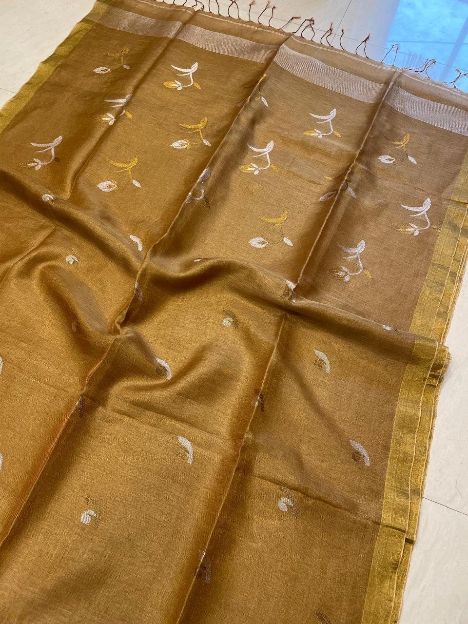Splendid Mustard Golden Handwoven Tissue Linen Saree With Floral Motif