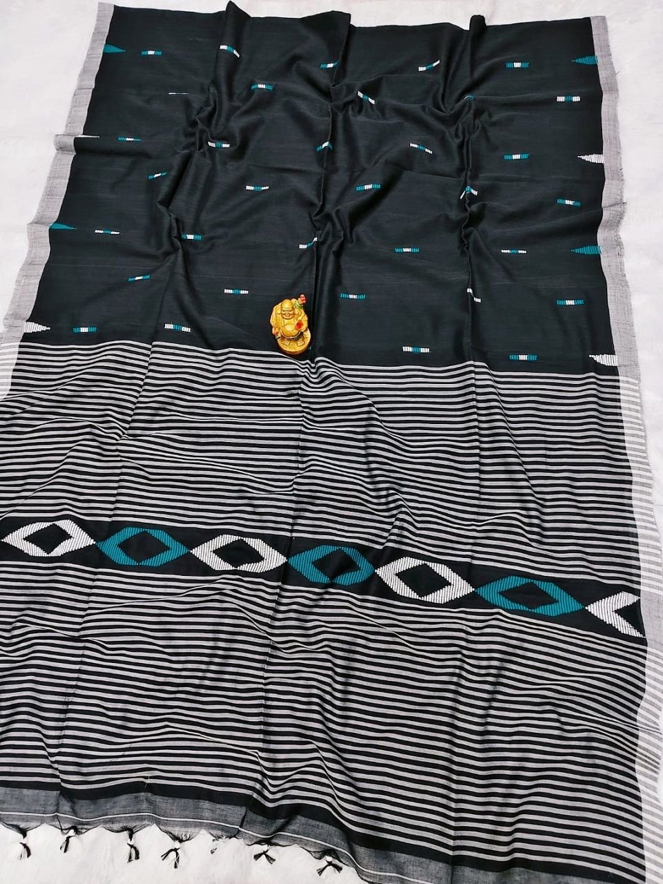 Black White Pure Cotton Handloom Saree With Allover Woven Ikkat Design Motifs Black White Pure Cotton Handloom Saree With Allover Woven Ikkat Design Motifs