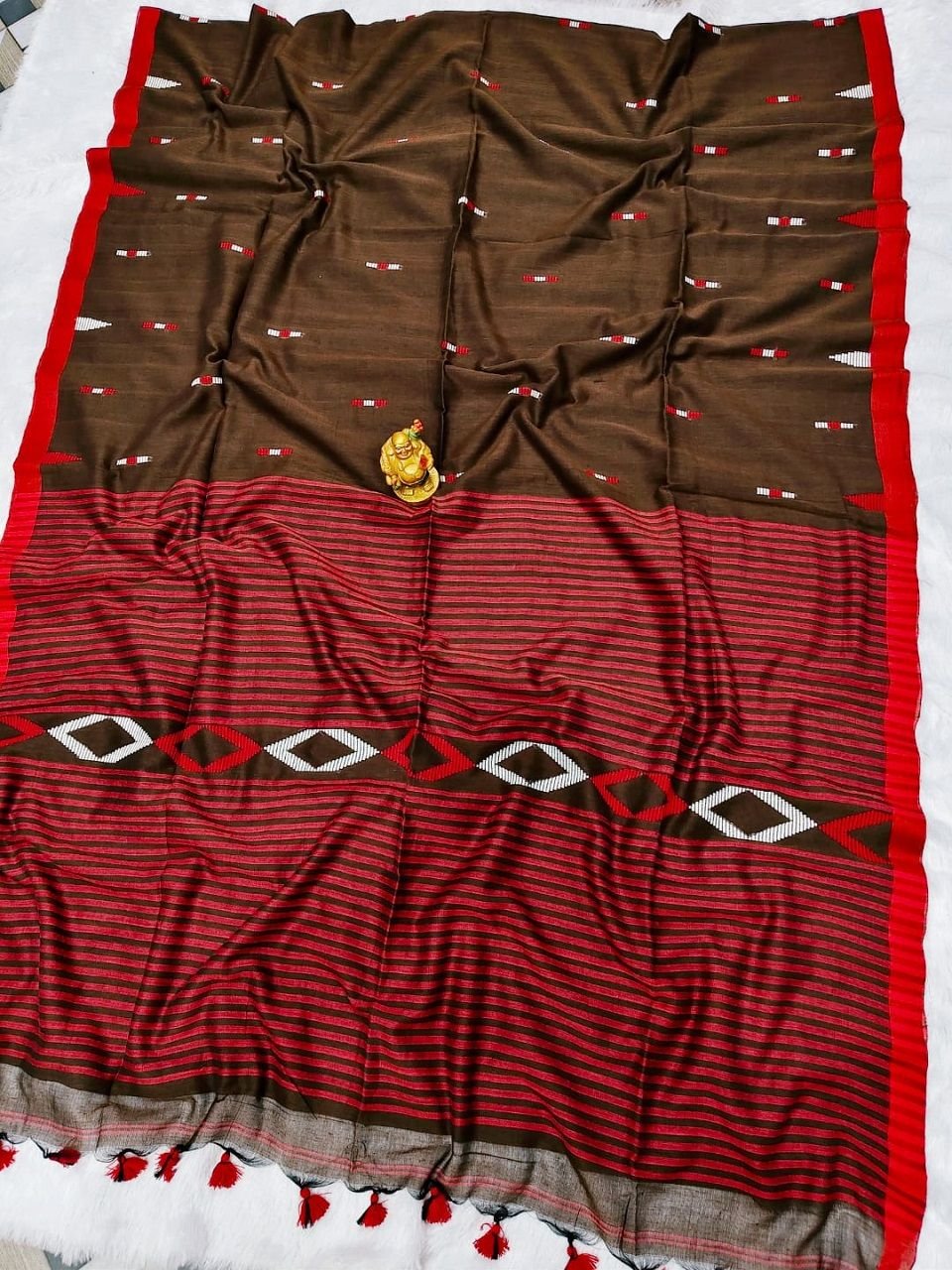 Brown Pure Cotton Handloom Saree With Allover Woven Ikkat Design Motifs Brown Pure Cotton Handloom Saree With Allover Woven Ikkat Design Motifs