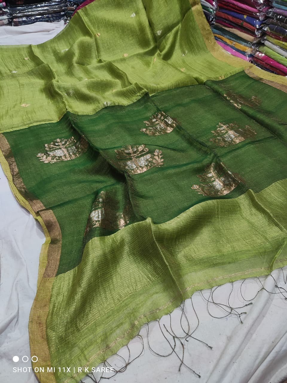 Grass Green Premium Silk Linen Handloom Saree With Zari Motif Grass Green Premium Silk Linen Handloom Saree With Zari Motif