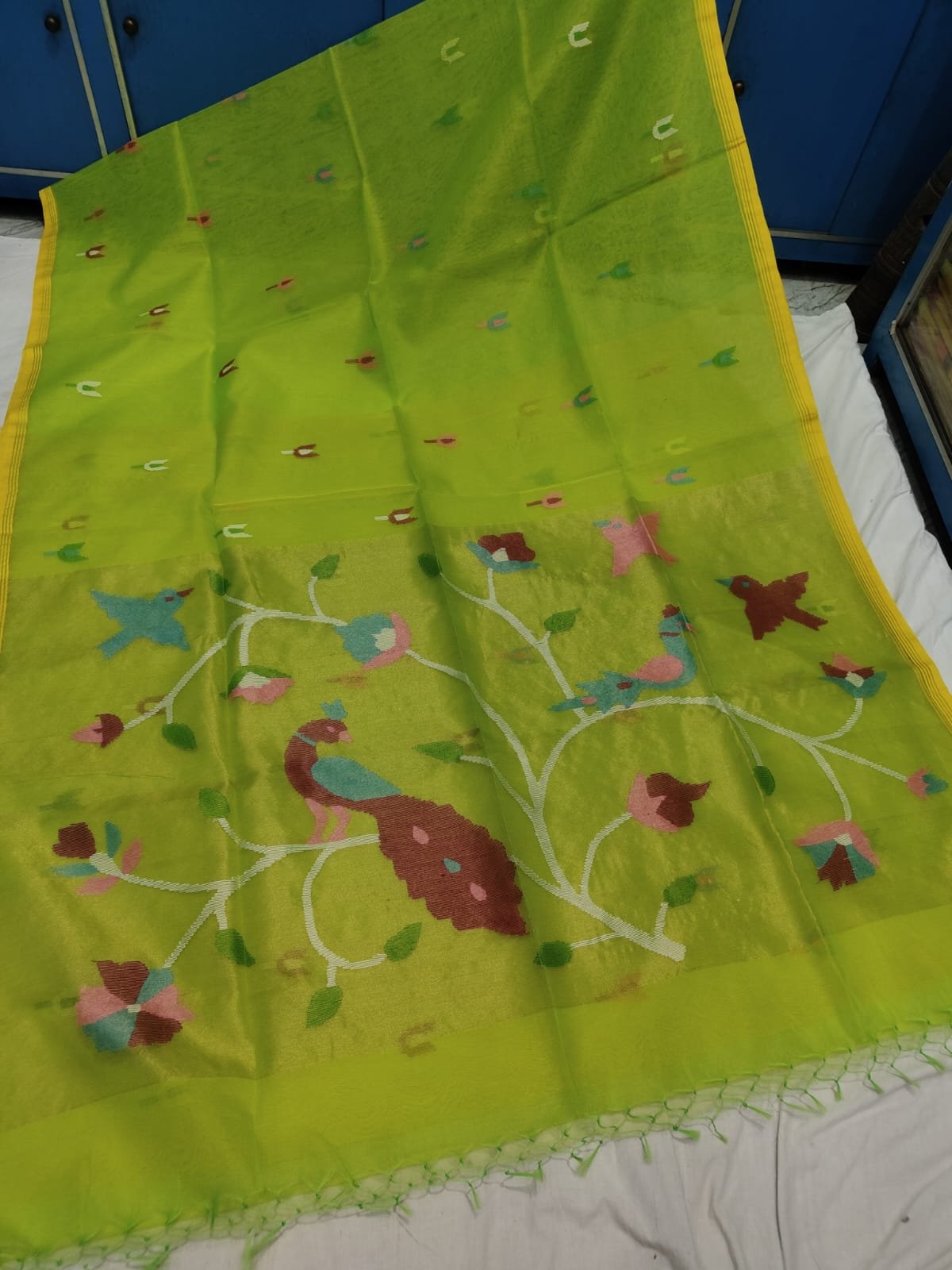 Lemon Green Muslin Jamdani Saree With Paithani Design Pallu Lemon Green Muslin Jamdani Saree With Paithani Design Pallu