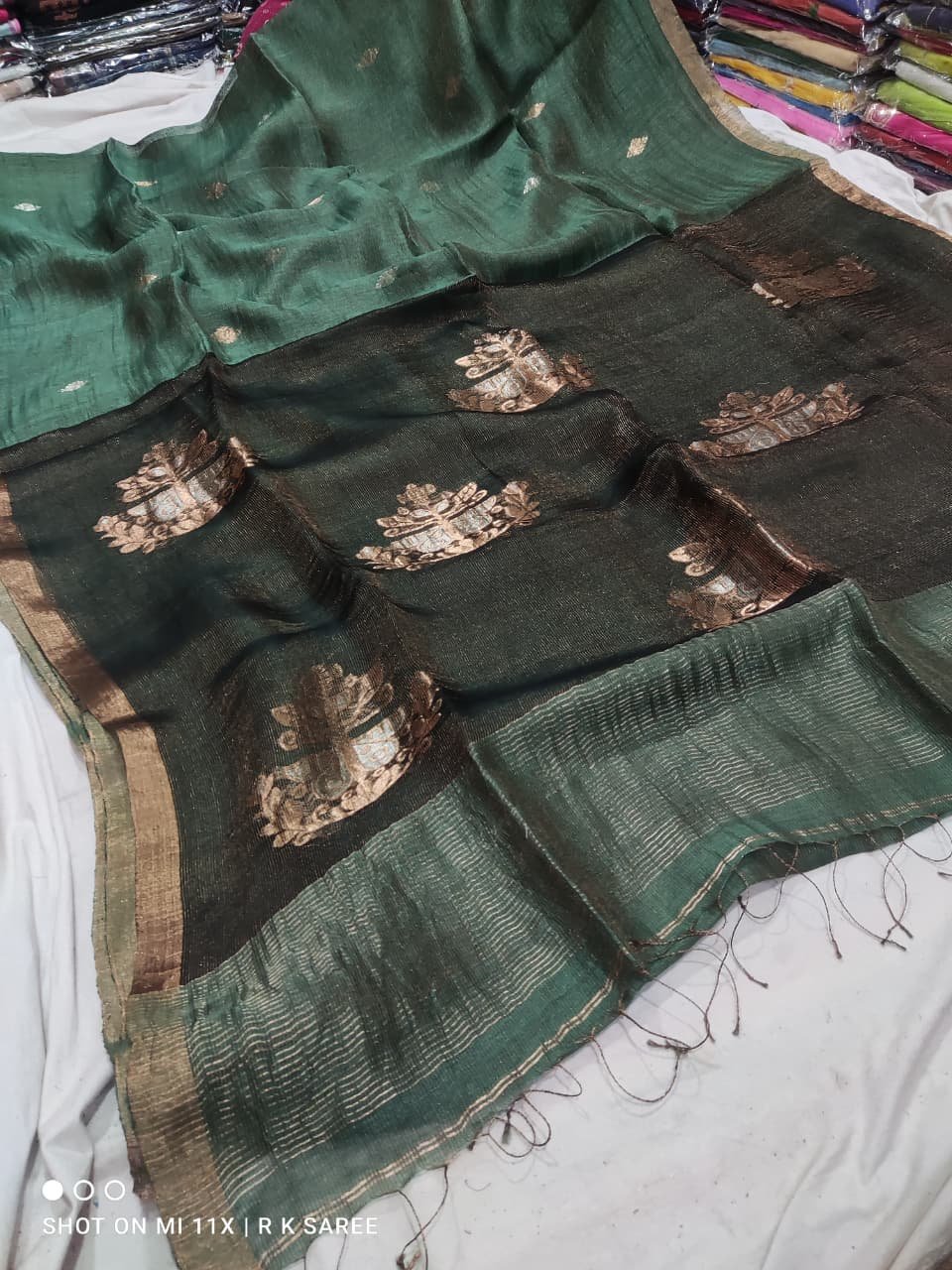 Sage Green Premium Silk Linen Handloom Saree With Zari Motif Sage Green Premium Silk Linen Handloom Saree With Zari Motif