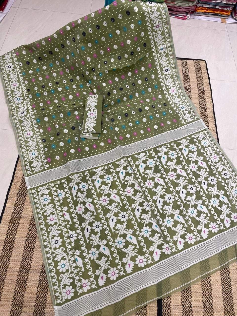 Dark Green Floral Dhakai Jamdani Cotton Silk Saree With Blouse Dark Green Floral Dhakai Jamdani Cotton Silk Saree With Blouse
