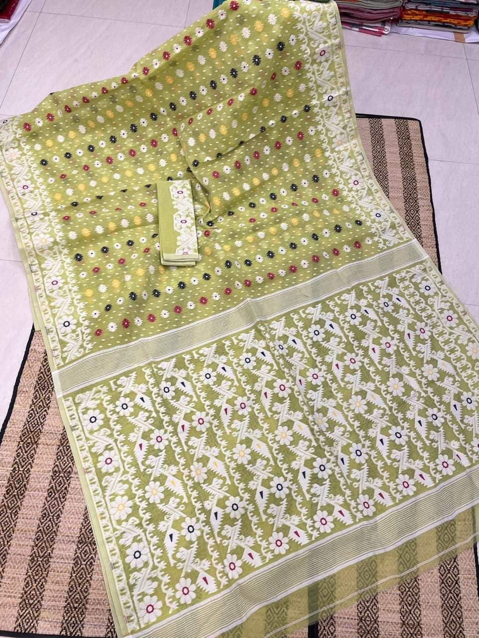 Mehendi Green Floral Dhakai Jamdani Cotton Silk Saree With Blouse Mehendi Green Floral Dhakai Jamdani Cotton Silk Saree With Blouse