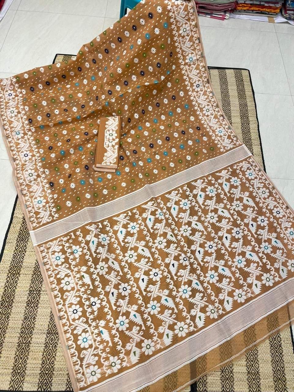 Mustard Brown Floral Dhakai Jamdani Cotton Silk Saree With Blouse Mustard Brown Floral Dhakai Jamdani Cotton Silk Saree With Blouse