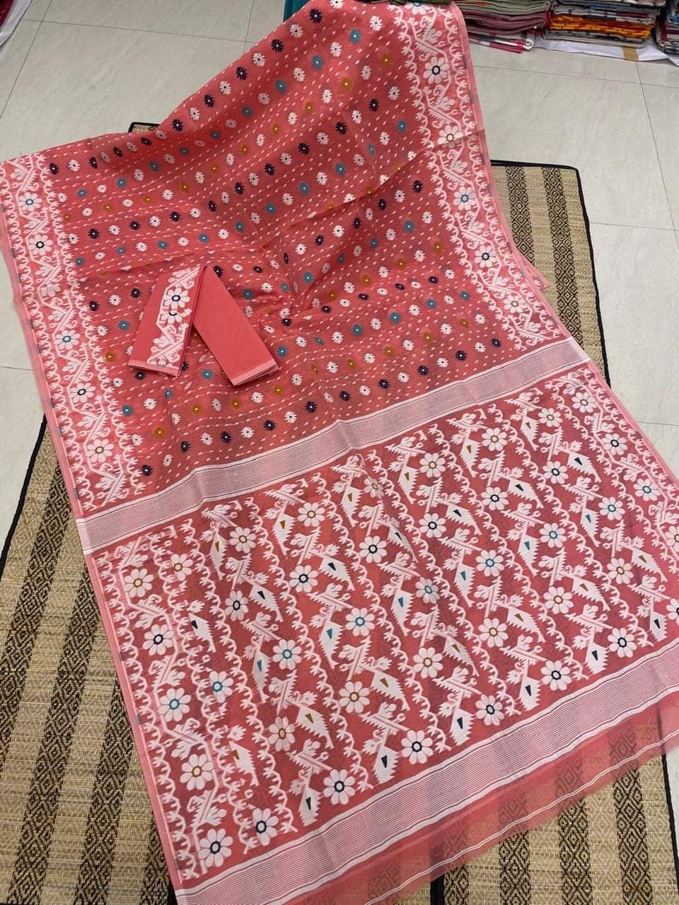 Peach Pink Floral Dhakai Jamdani Cotton Silk Saree With Blouse Peach Pink Floral Dhakai Jamdani Cotton Silk Saree With Blouse