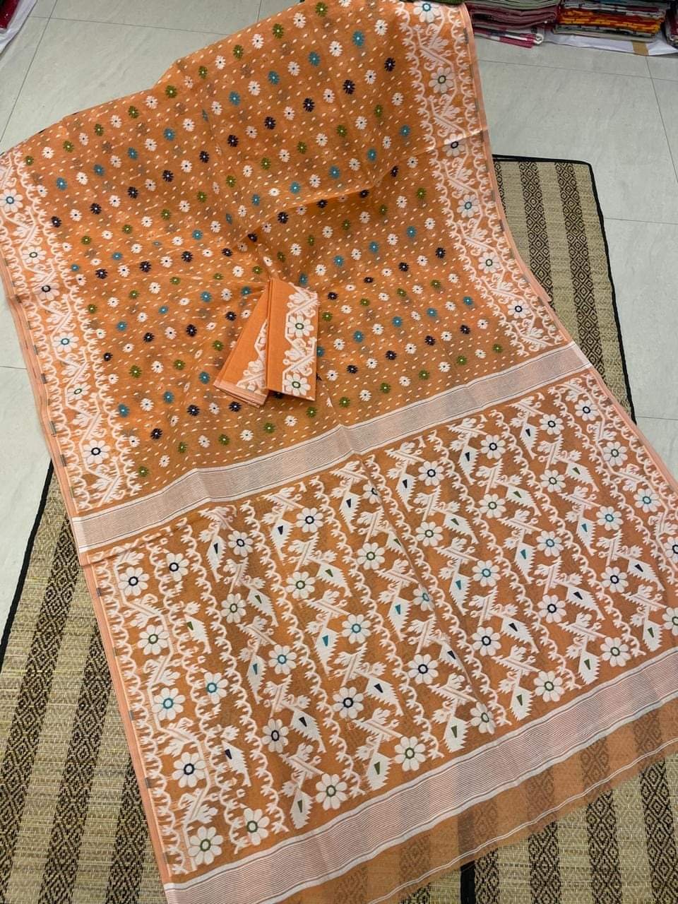 Rust Orange Floral Dhakai Jamdani Cotton Silk Saree With Blouse Rust Orange Floral Dhakai Jamdani Cotton Silk Saree With Blouse