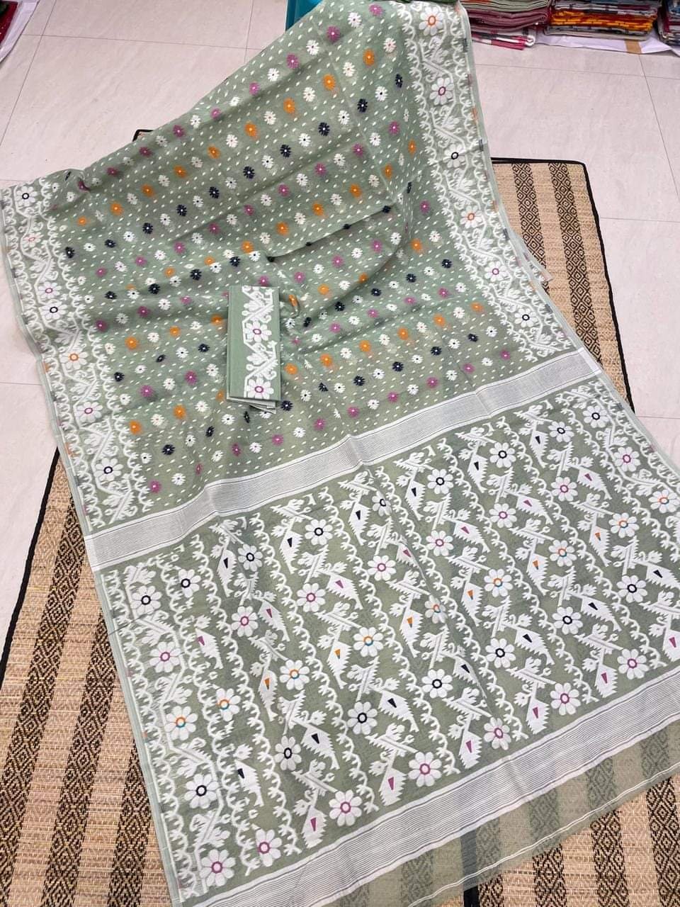 Sage Green Floral Dhakai Jamdani Cotton Silk Saree With Blouse Sage Green Floral Dhakai Jamdani Cotton Silk Saree With Blouse