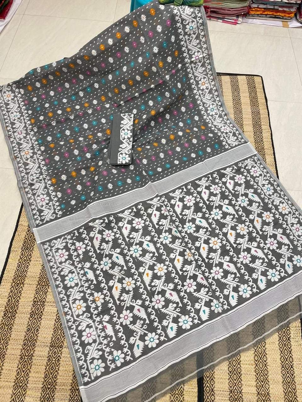 Slate Grey Floral Dhakai Jamdani Cotton Silk Saree With Blouse Slate Grey Floral Dhakai Jamdani Cotton Silk Saree With Blouse