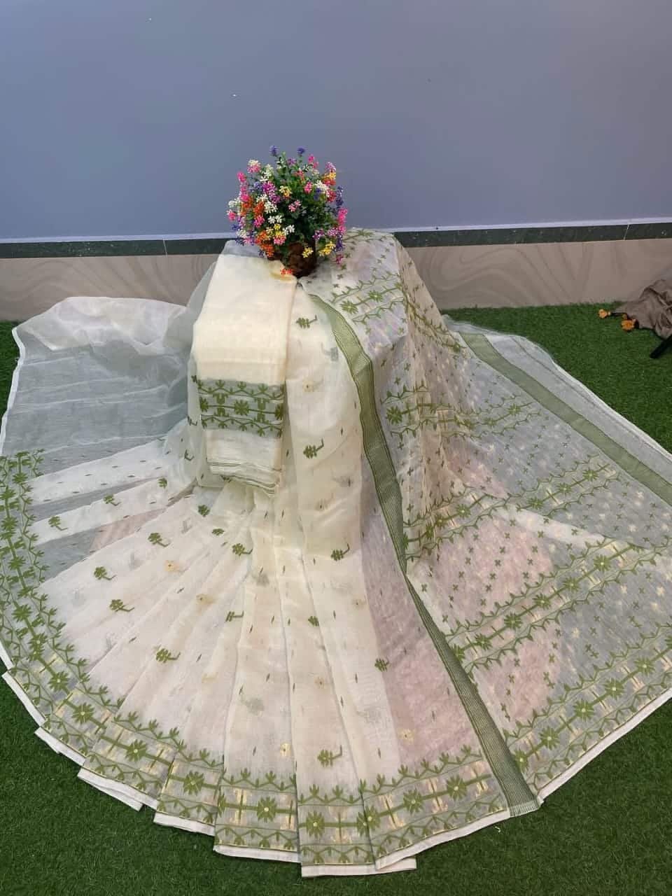 Cooling White Green Dhakai Jamdani Saree With Blouse Piece Cooling White Green Dhakai Jamdani Saree With Blouse Piece