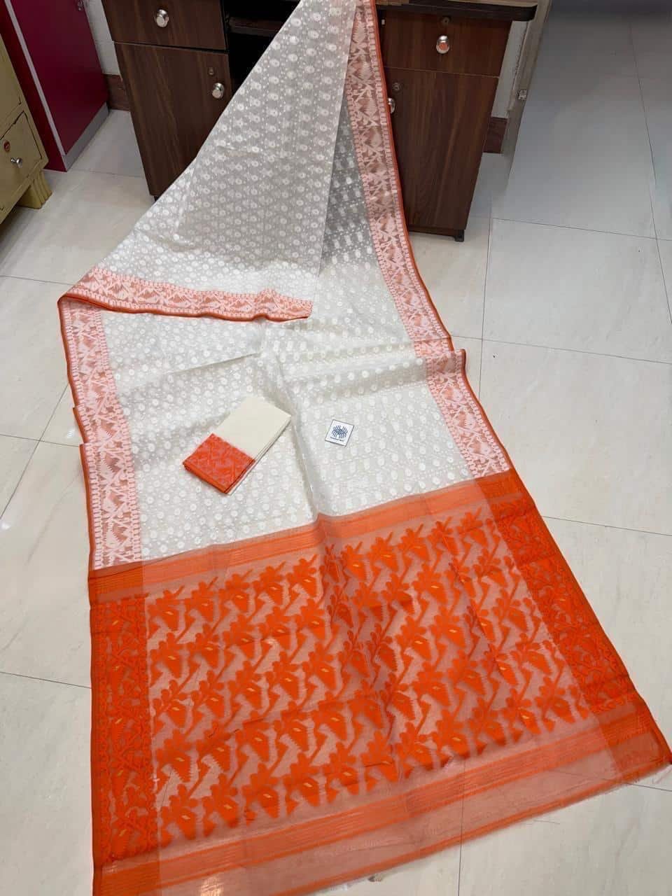 White Orange Dhakai Jamdani Semi Polished With Blouse Piece White Orange Dhakai Jamdani Semi Polished With Blouse Piece